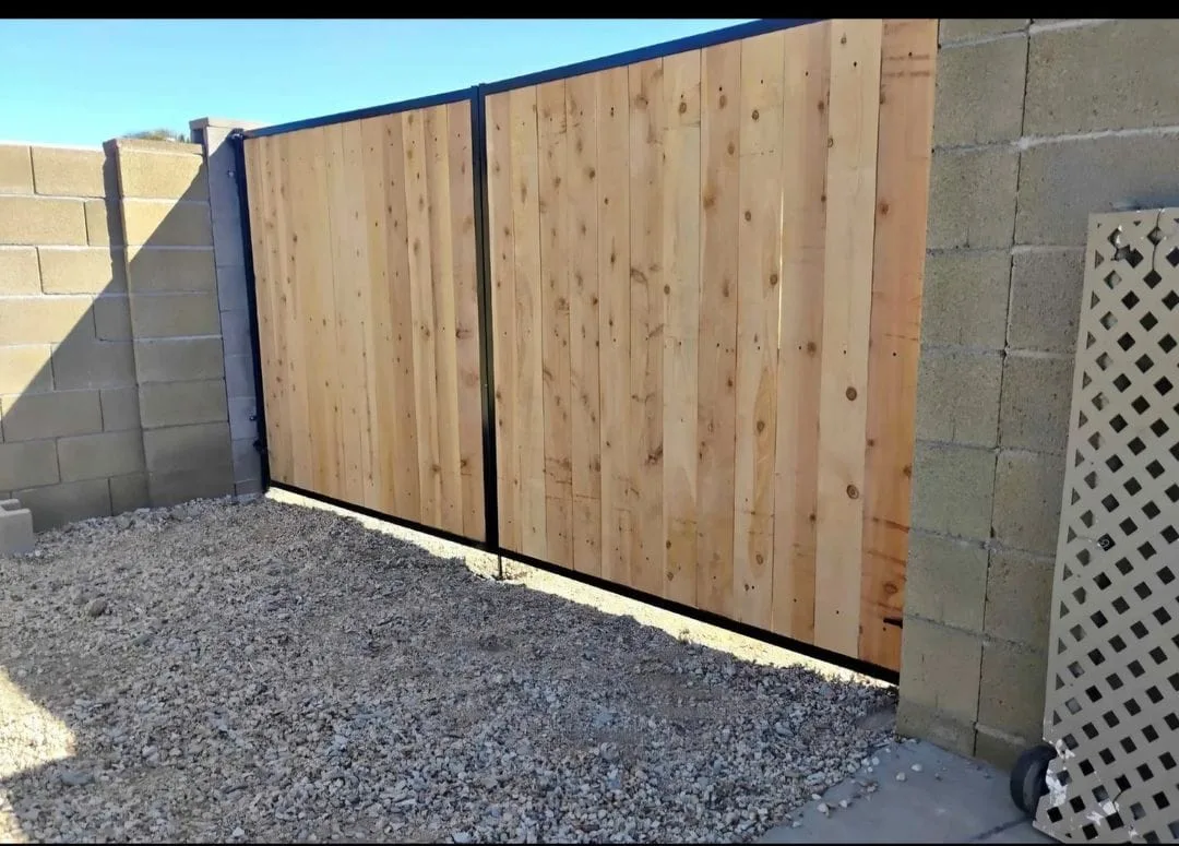 New cedar fence and gate on a block wall