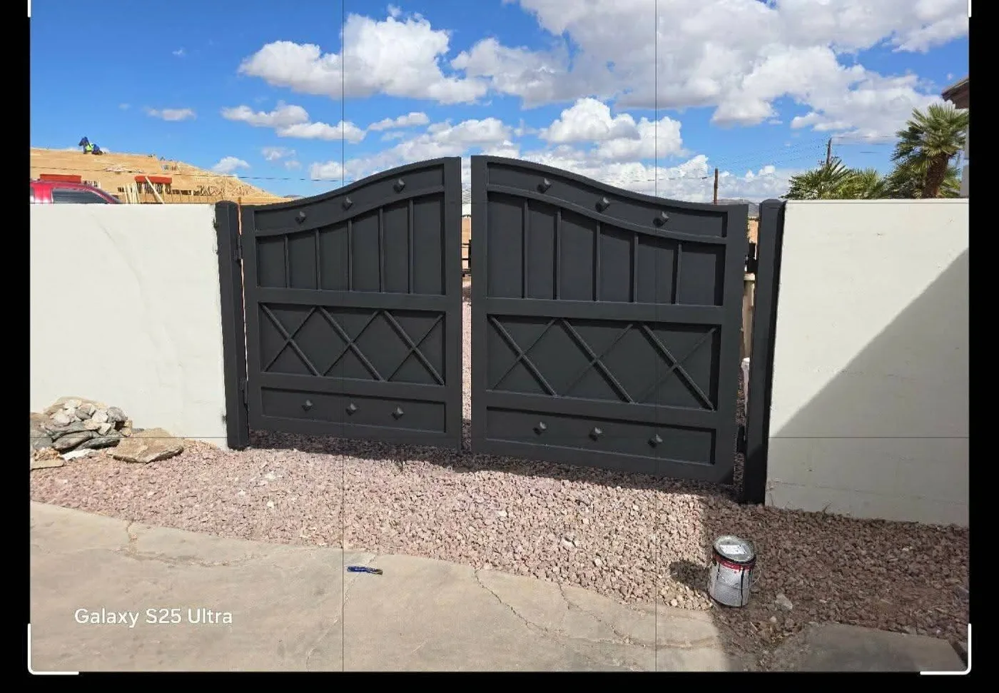 Black double gate with X-brace design