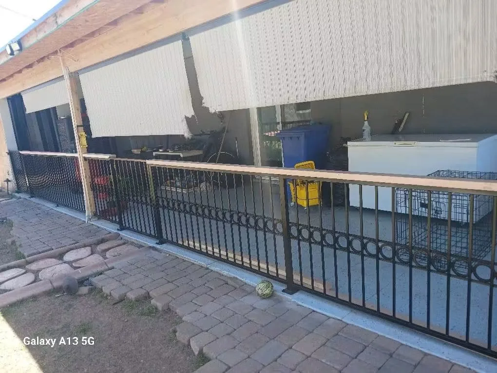 Metal railing around a patio